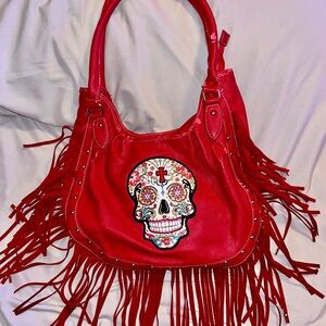 Vibrant Red Fringe Shoulder Bag with Decorative Sugar Skull
